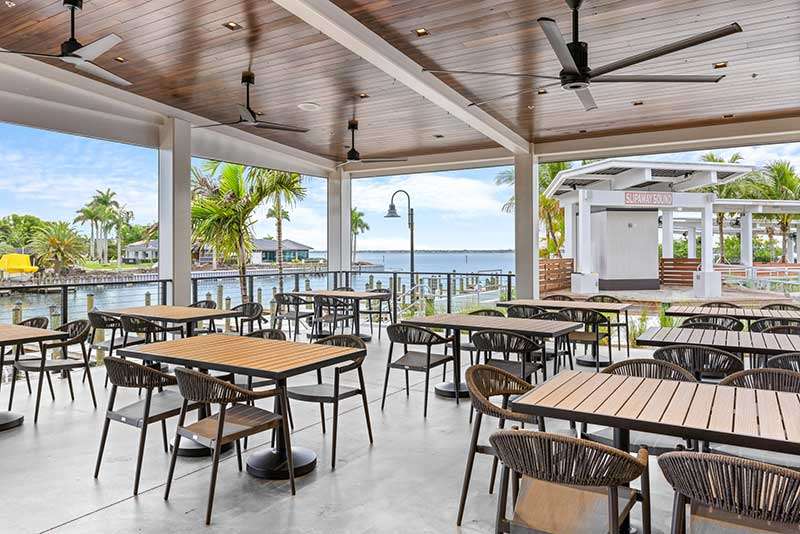 Outdoor dining area with waterfront views
